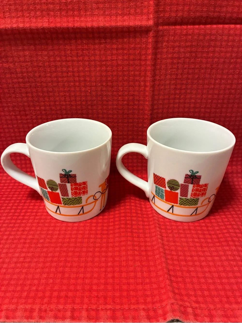 Set of 2 Crate & Barrel Jenny Bowers 2014 Christmas Reindeer & Sleigh Mugs